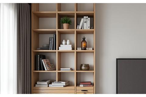 A tall, narrow modular shelving unit on a wall, neatly displaying books and decorative items, emphasizing vertical space utilization.